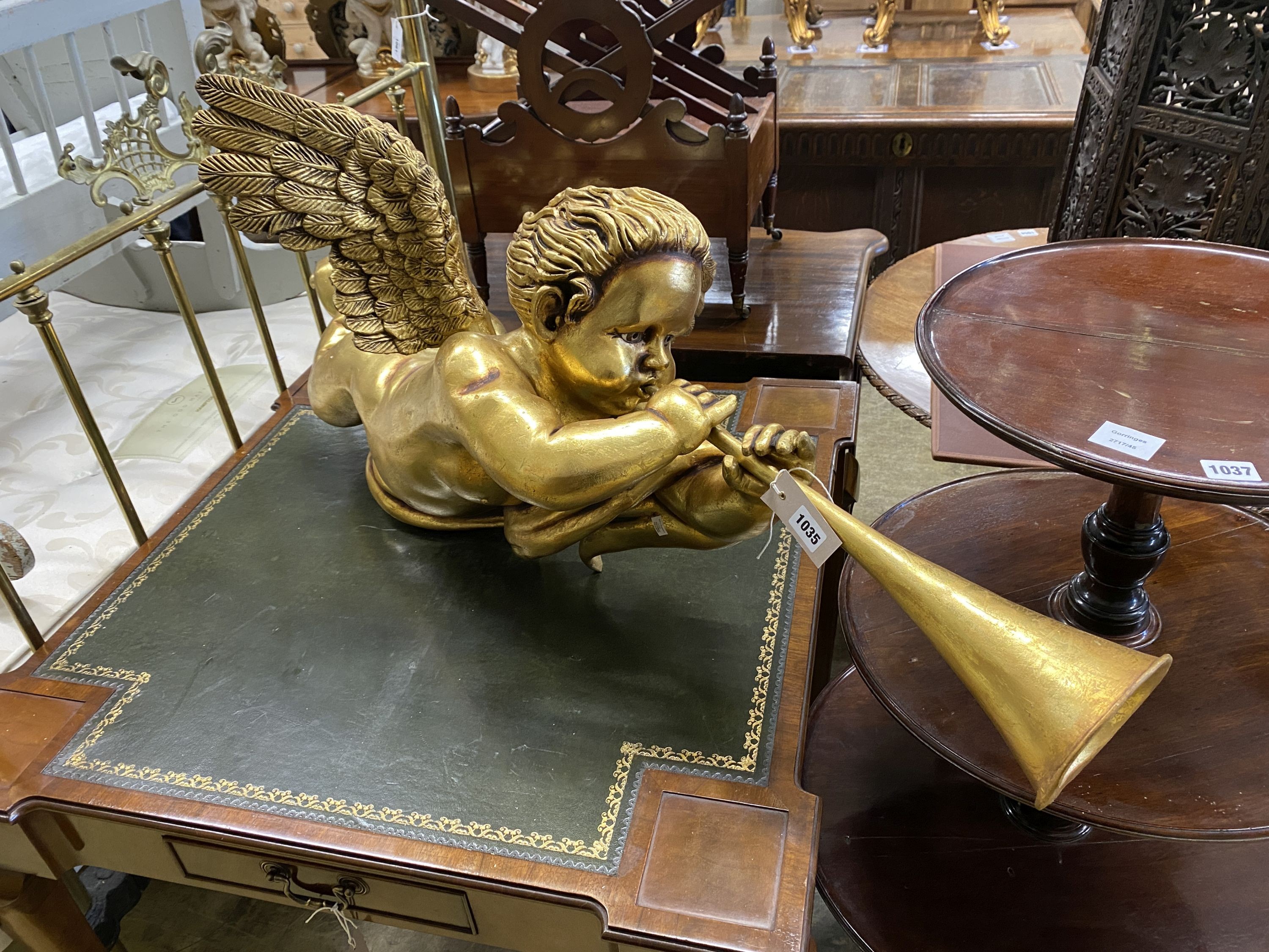 A gilt composition hanging herald angel, length 130cm